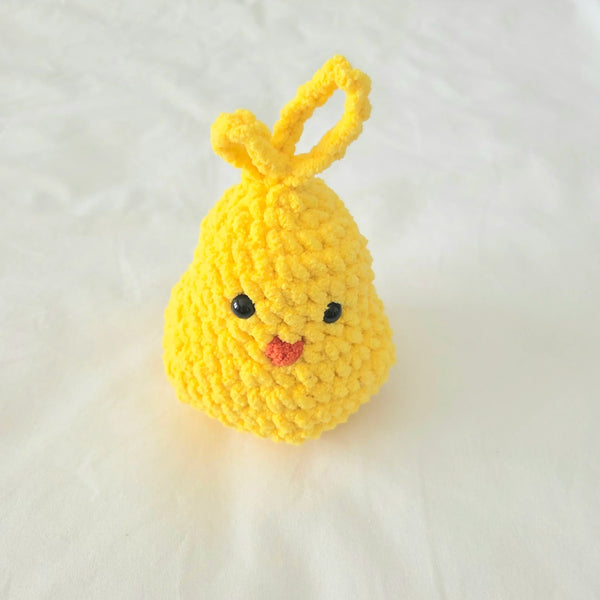 Handmade yellow crochet chick with black eyes and pink beak, perfect Easter gift or nursery decor