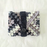 Handmade crochet clutch in gray, cream, and black with button closure, cozy and creative gift