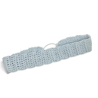 Light blue crocheted headband with metal ring, handmade for cozy comfort and style