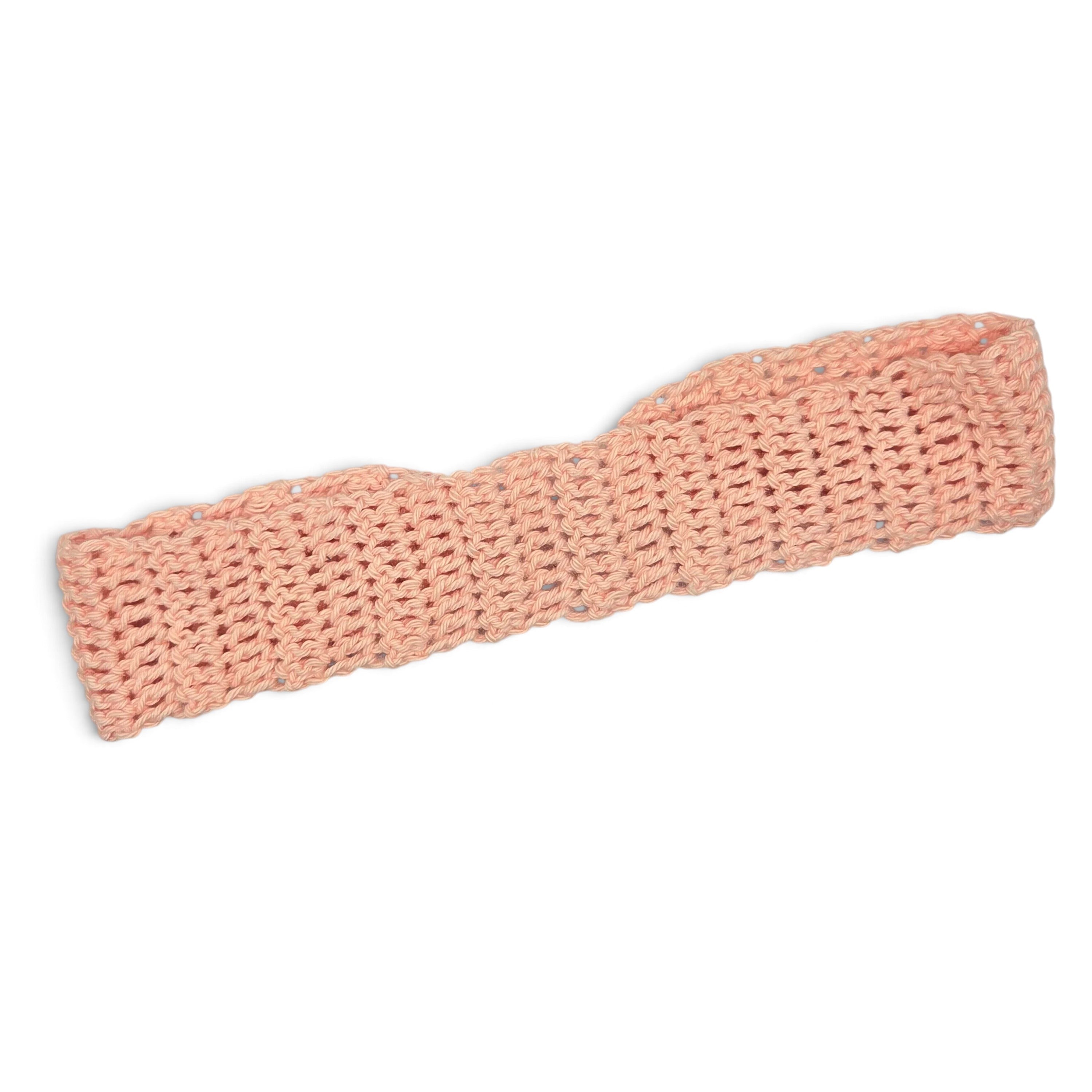 Soft pink crochet headband, handmade with cozy open stitch pattern for everyday comfort