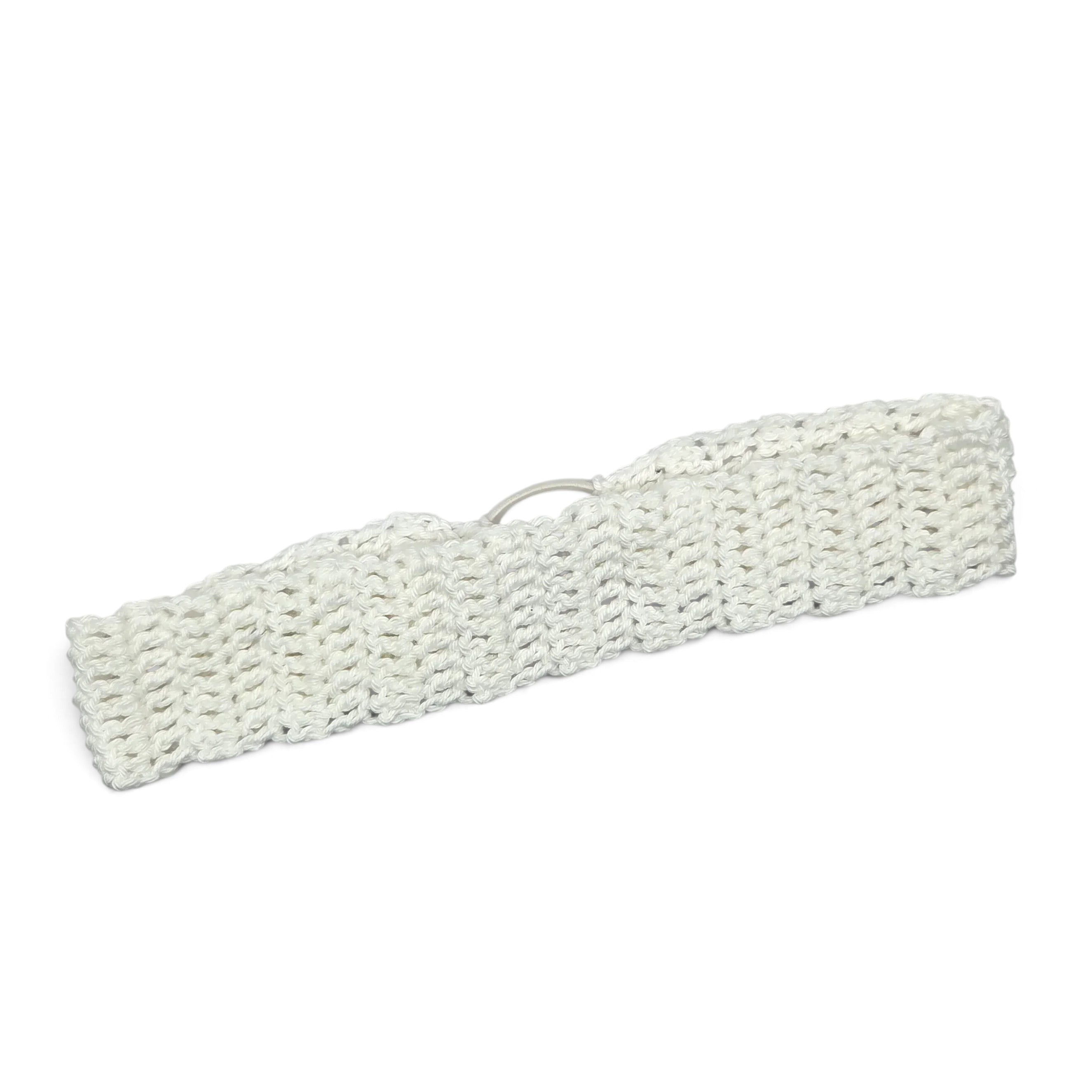 Handmade white crochet headband with open stitch pattern, cozy and stylish accessory for everyday wear.