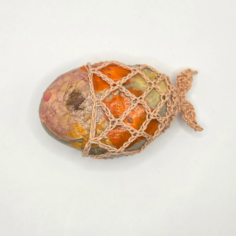 Handmade crochet-wrapped stone with pressed flowers, cozy autumn decor gift