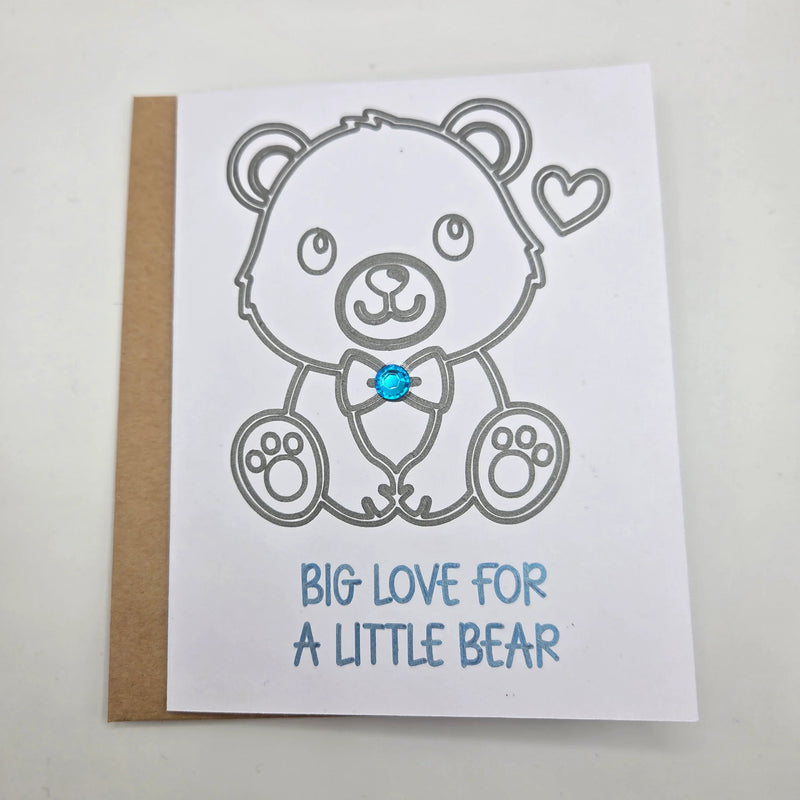 Handmade baby card with silver bear outline, blue gem, heart, and 'Big Love for a Little Bear' text