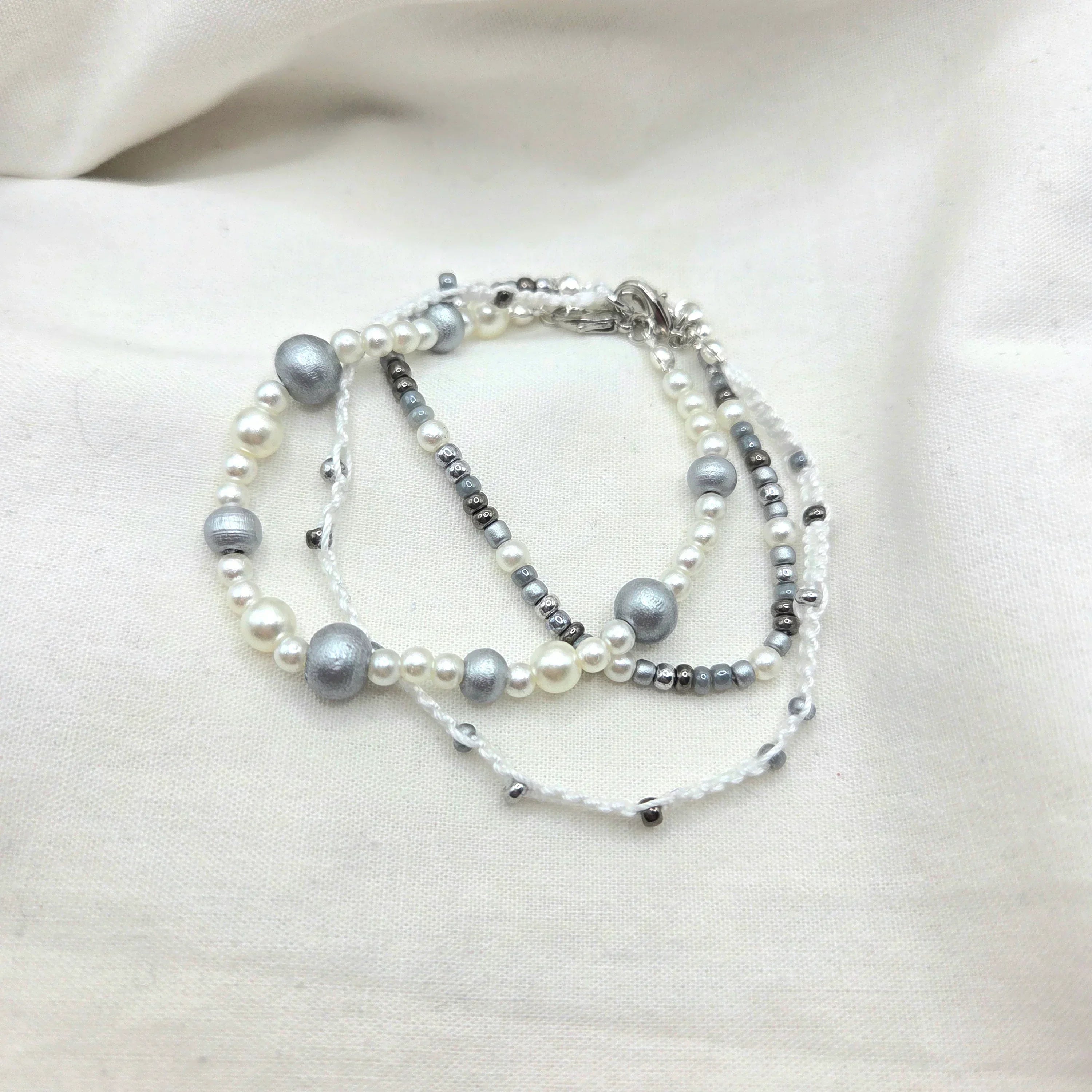 Handmade pearl and silver bead necklace with white cord, elegant and cozy accessory