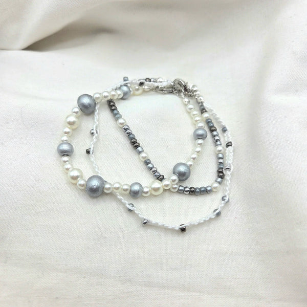 Handmade pearl and silver bead necklace with white cord, elegant and cozy accessory