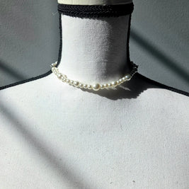 Elegant pearl choker necklace on mannequin, delicate handmade jewelry for everyday wear