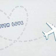 Handmade by Erika Liesel With Love greeting card featuring a shiny silver airplane and a dashed heart flight path.