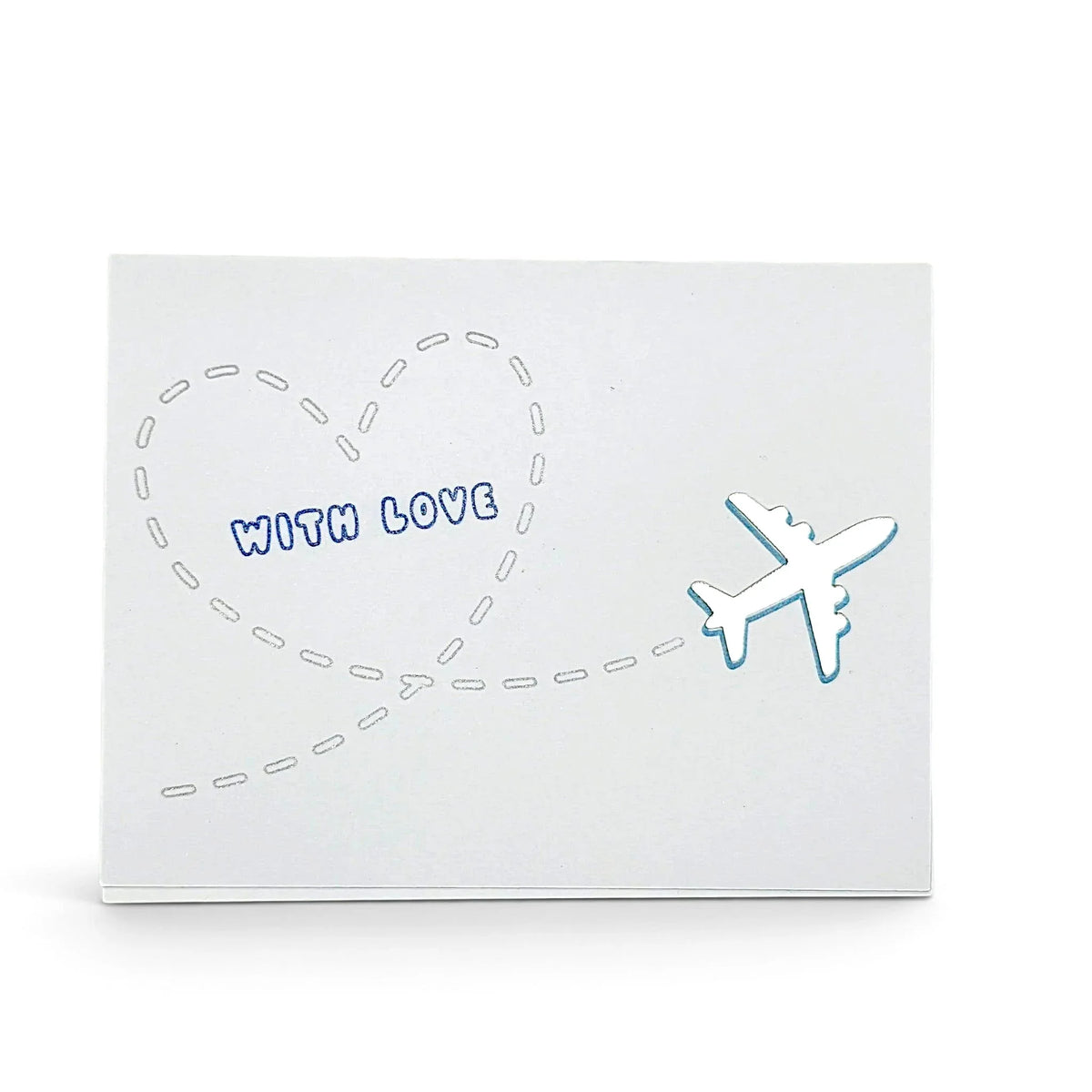 Handmade by Erika Liesel With Love card featuring a shiny airplane and heart flight path on premium cardstock