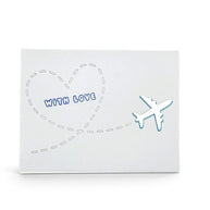 Handmade by Erika Liesel With Love card featuring a shiny airplane and heart flight path on premium cardstock