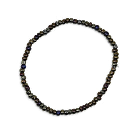 Handmade by Erika Liesel Aurora stretch bracelet featuring iridescent glass beads in bronze, purple, blue, and green.