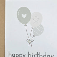Handmade by Erika Liesel birthday card featuring neutral balloons with heart, star, and gemstone detail on white card