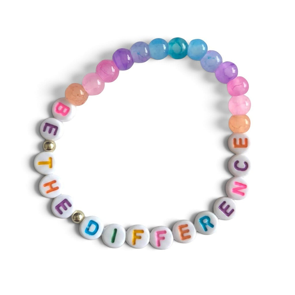 Handmade by Erika Liesel Be the Difference bracelet with colorful glass beads and white lettered message beads.