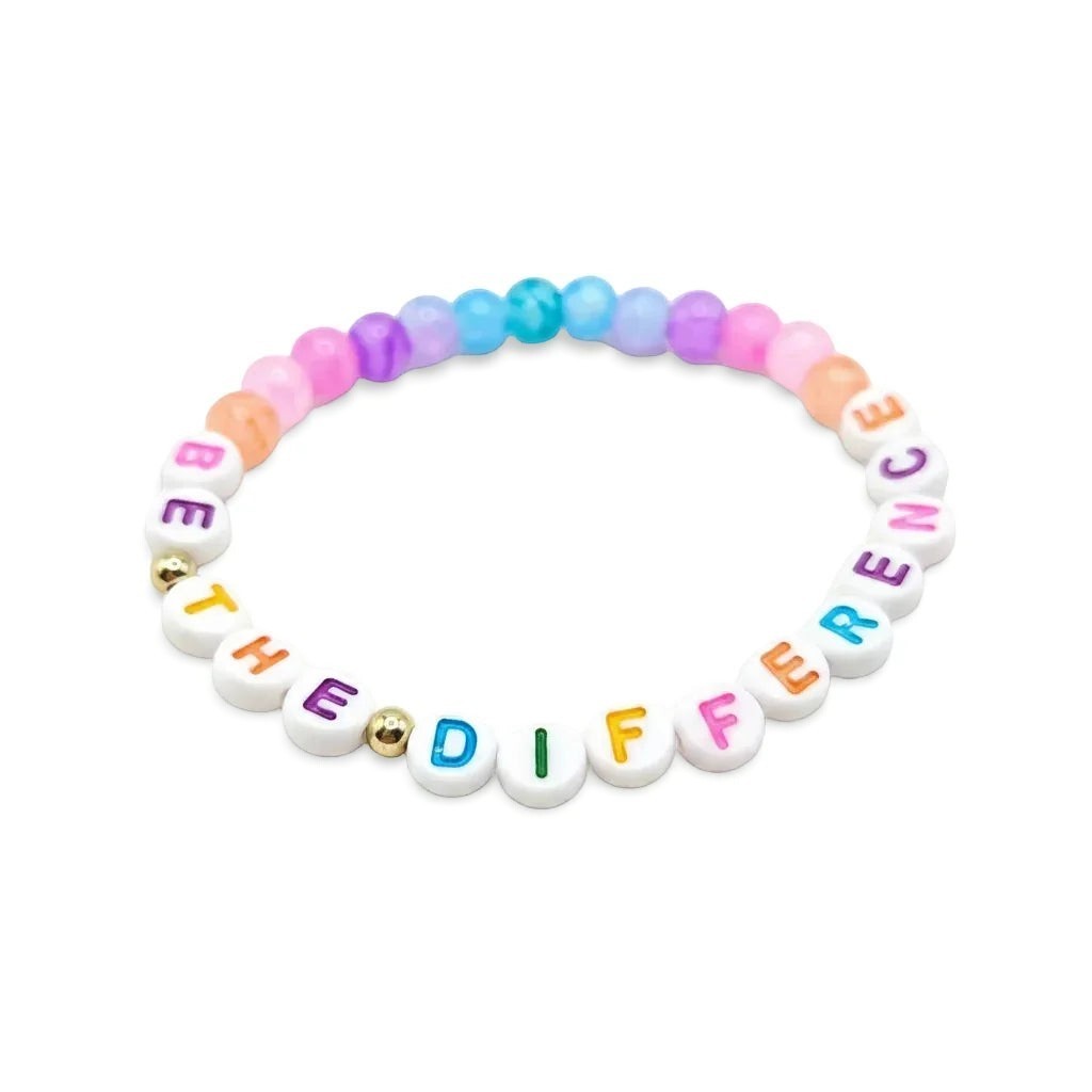 Handmade by Erika Liesel Be the Difference bracelet with colorful glass beads and white lettered beads on elastic