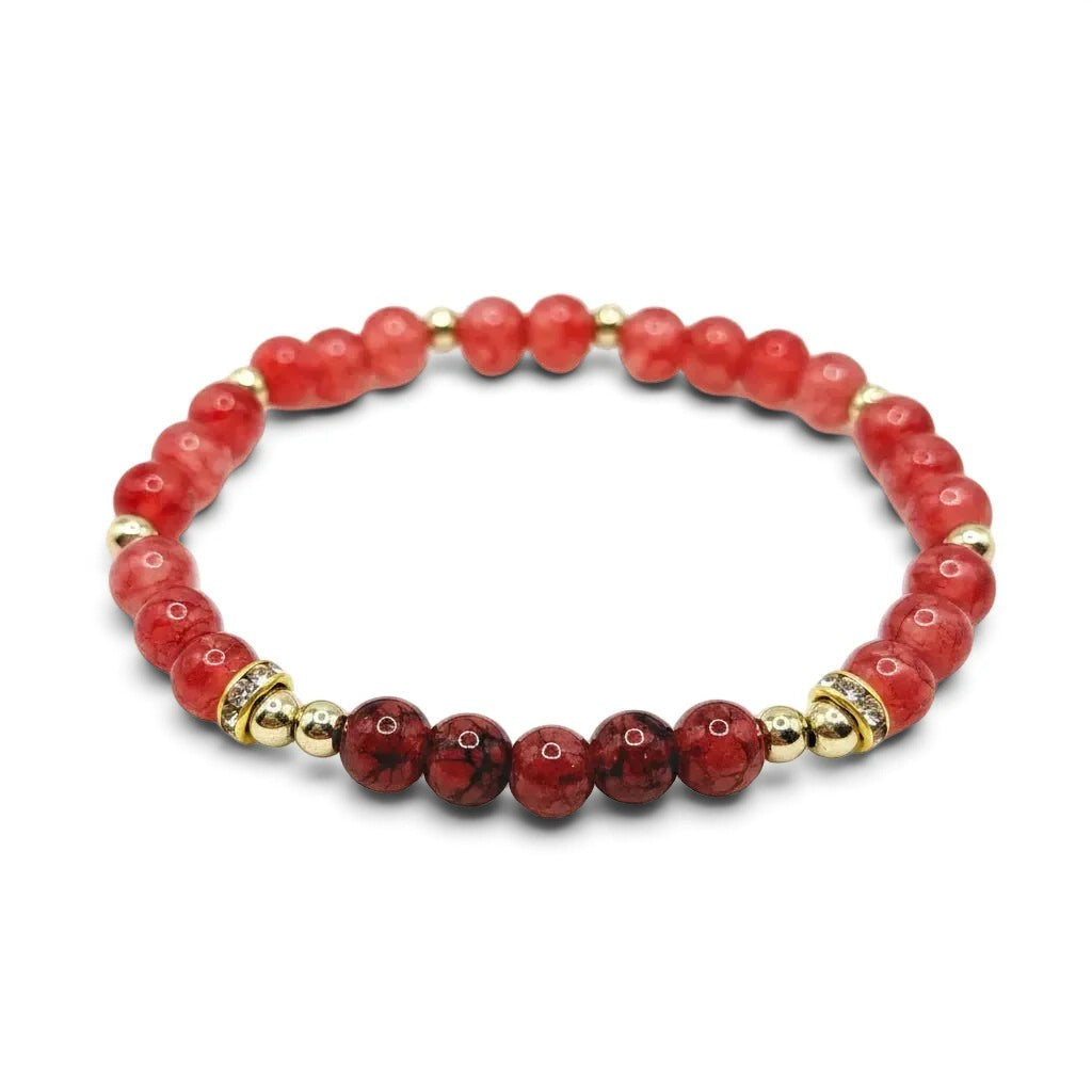 Handmade by Erika Liesel Berry Blush stretch bracelet featuring marbled berry glass beads and gold accent spacers.