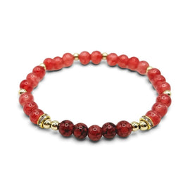 Handmade by Erika Liesel Berry Blush stretch bracelet featuring marbled berry glass beads and gold accent spacers.