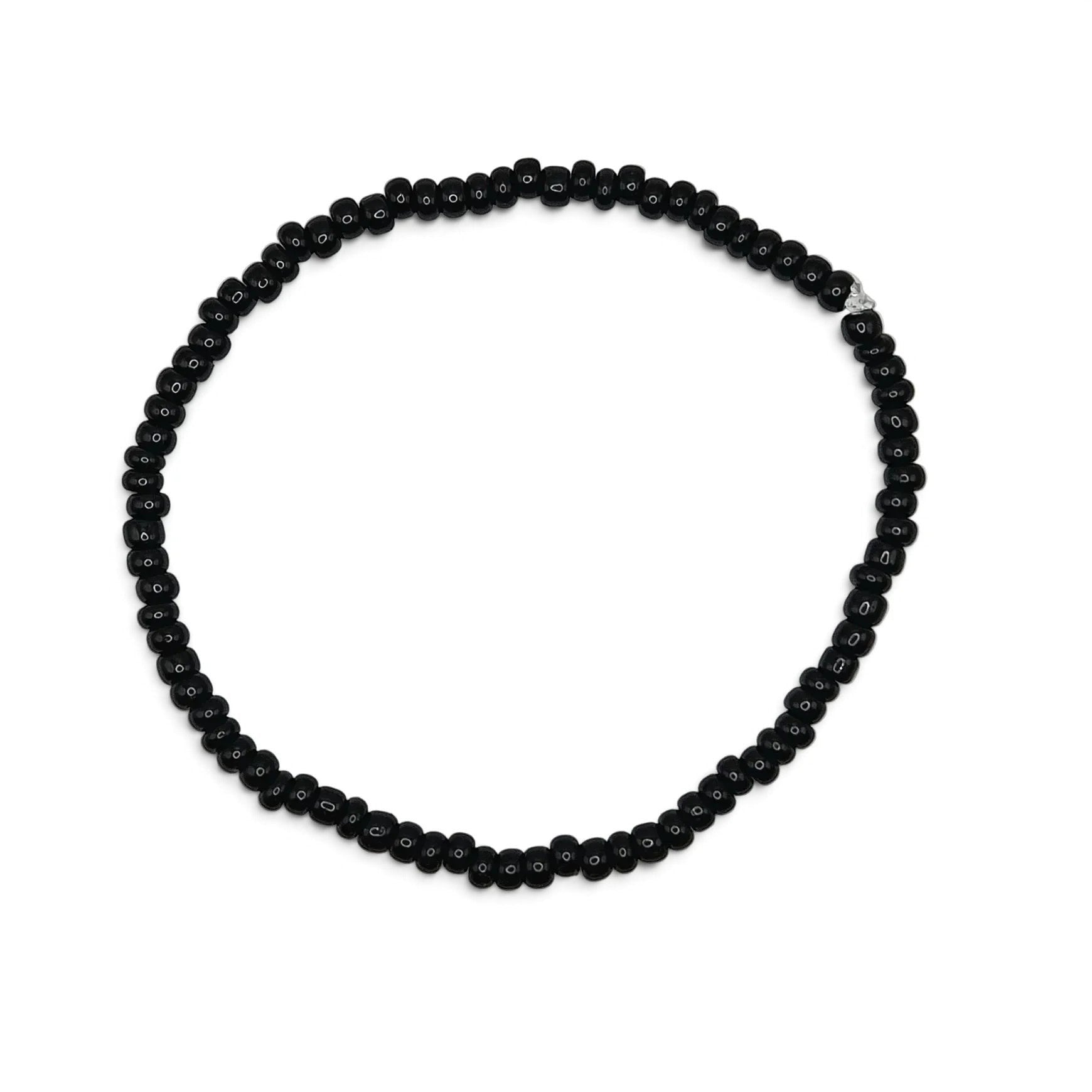 Handmade by Erika Liesel minimalist stretch bracelet featuring glossy 3mm black glass beads on a durable elastic cord.