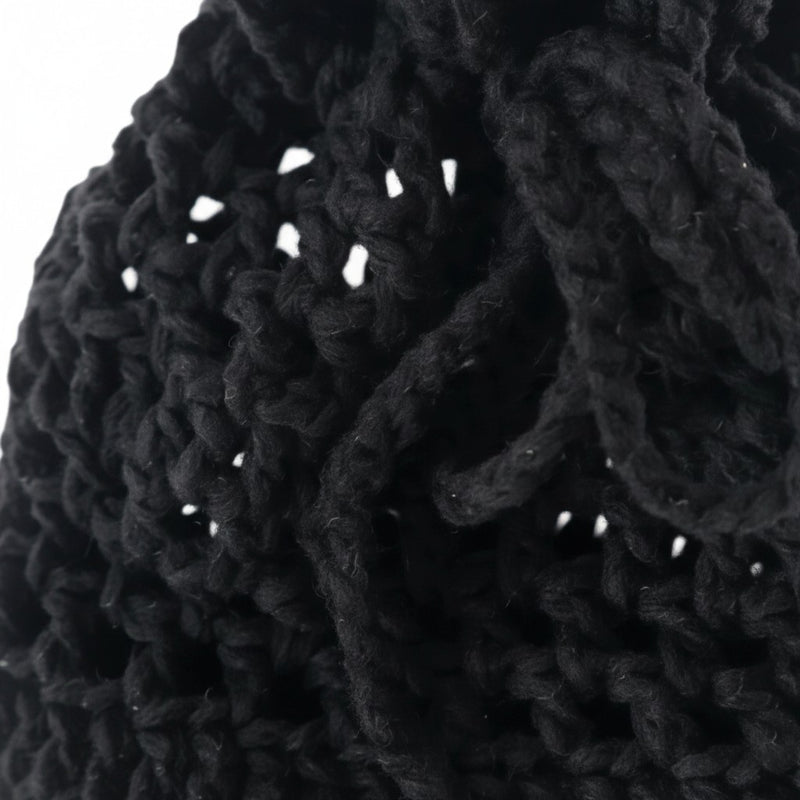 Handmade by Erika Liesel black crochet drawstring bag made from soft premium yarn for jewelry or gift storage.