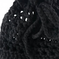 Handmade by Erika Liesel black crochet drawstring bag made from soft premium yarn for jewelry or gift storage.