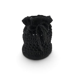 Handmade by Erika Liesel black crochet drawstring bag made from buttery-soft yarn for jewelry or gift storage.