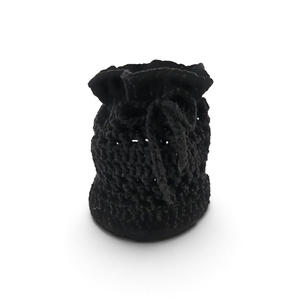 Handmade by Erika Liesel black crochet drawstring bag made from buttery-soft yarn for jewelry or gift storage.