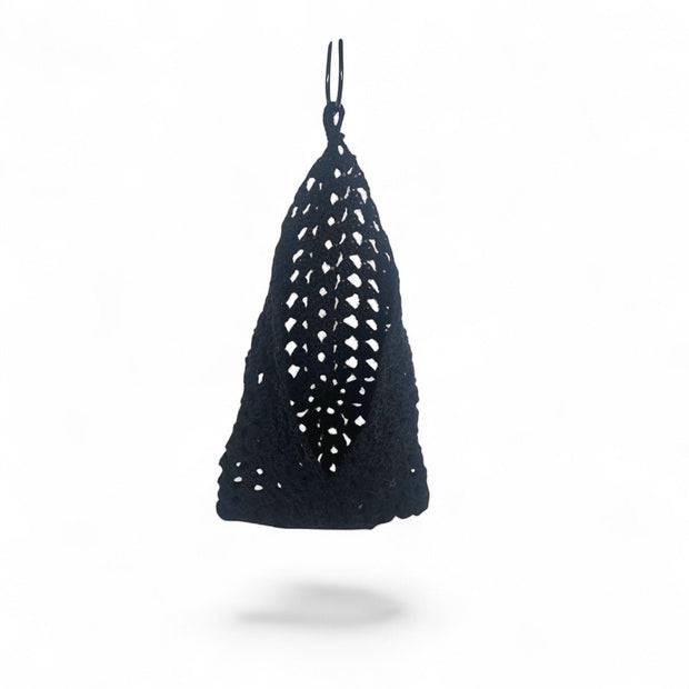 Handmade by Erika Liesel black crochet hanging basket with an open weave design for home storage and decor.