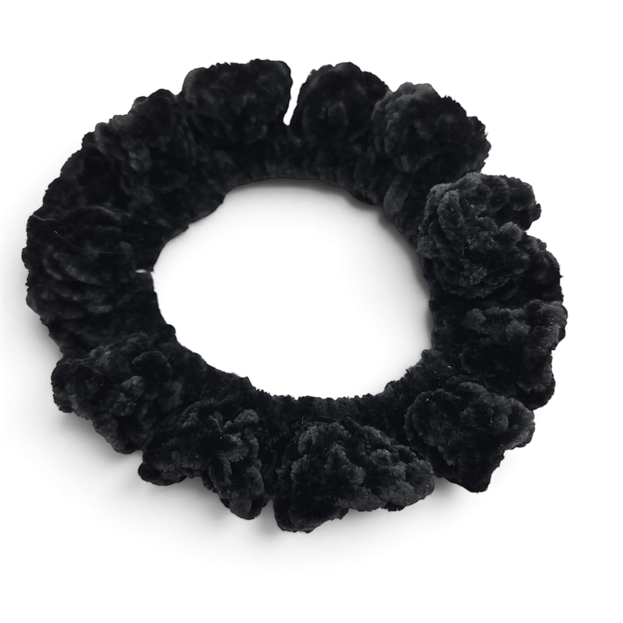 Handmade by Erika Liesel black crochet scrunchie made from soft premium yarn for a polished and cozy hair accessory.