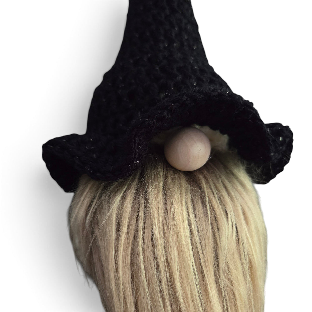 Handmade by Erika Liesel black crochet witch hat with subtle shimmer on a seasonal gnome with a blonde beard
