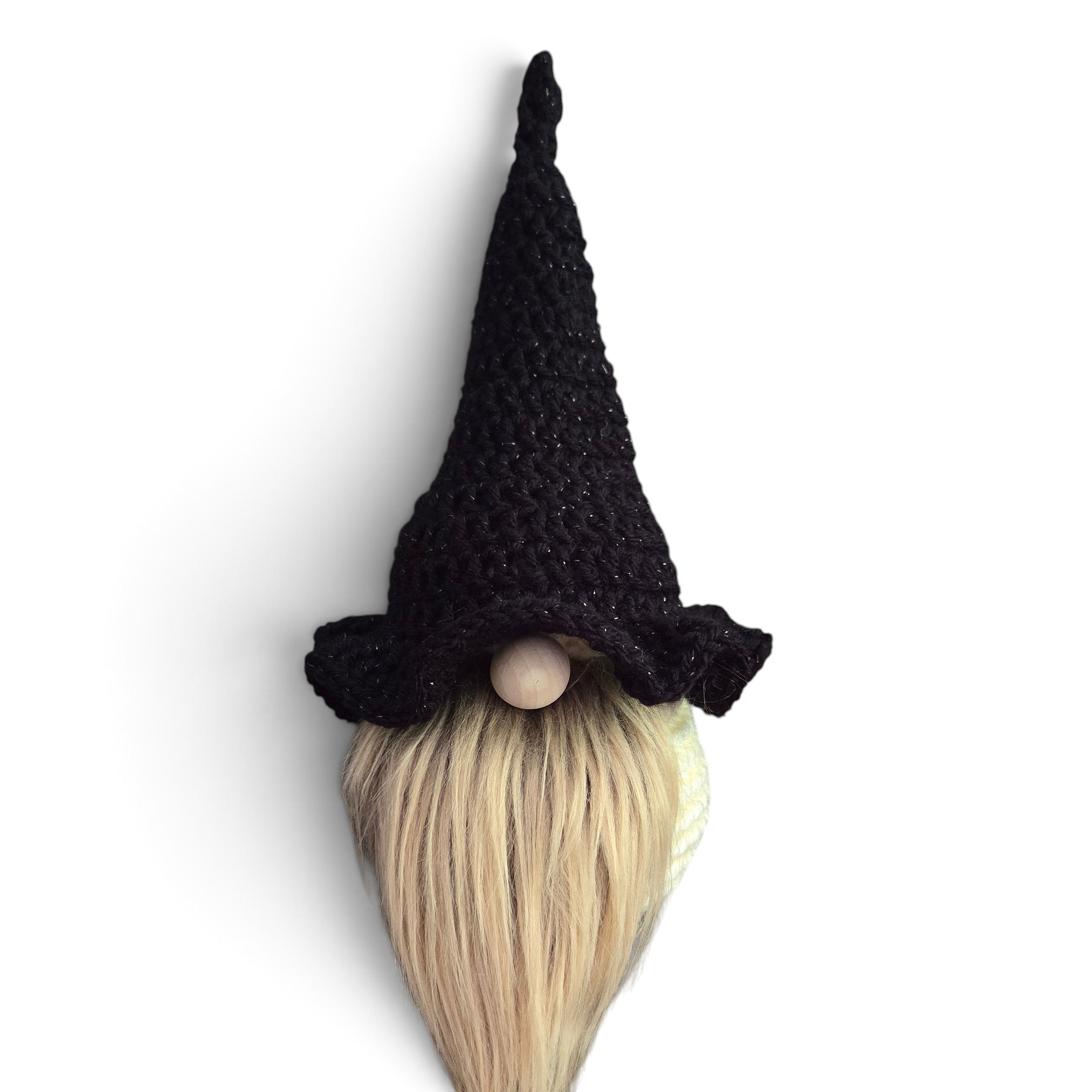 Handmade by Erika Liesel black crochet witch hat with subtle shimmer, designed for a seasonal gnome figurine.