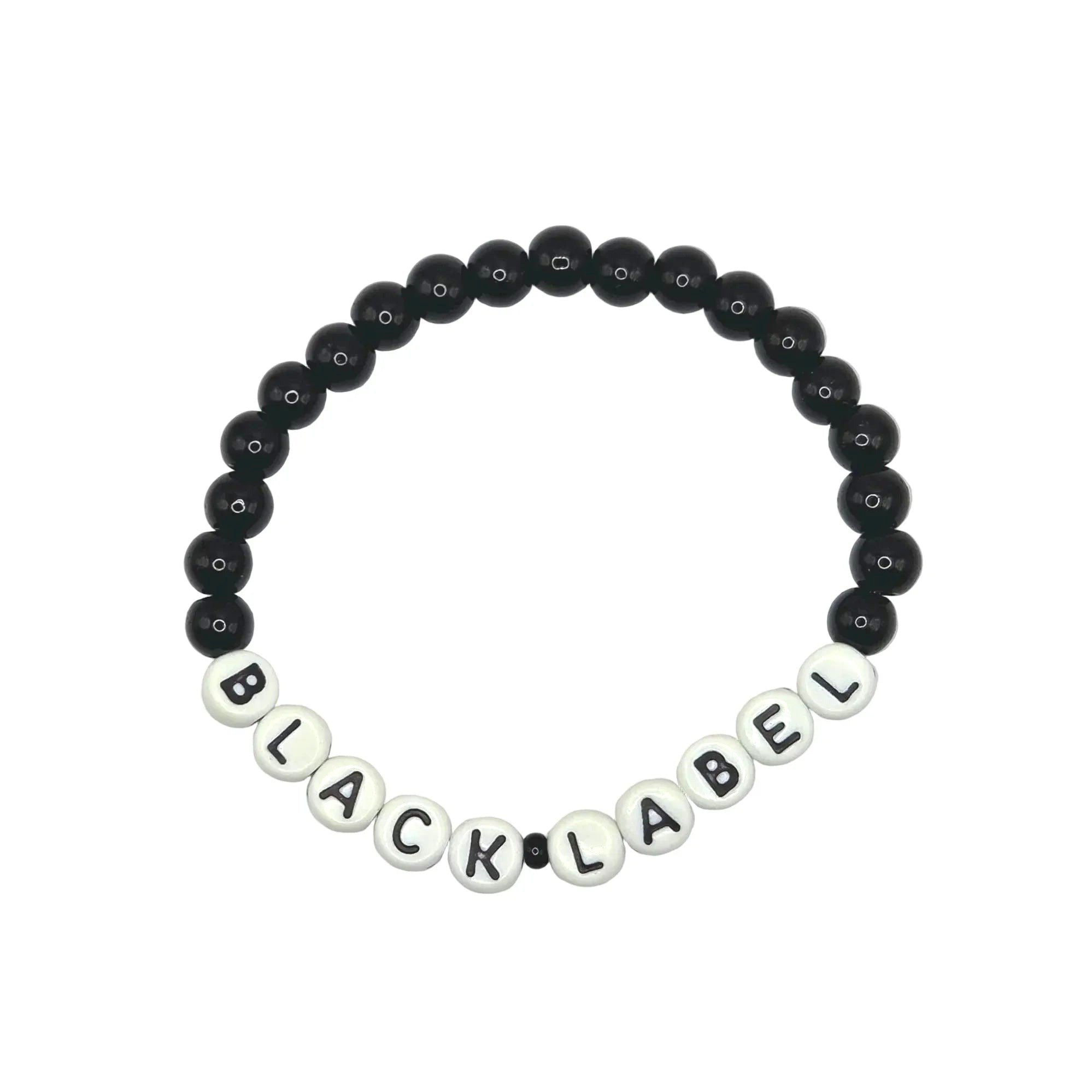 Handmade by Erika Liesel Black Label stretch bracelet with black glass beads and white letter beads on elastic cord.