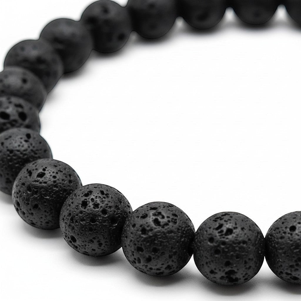 Handmade by Erika Liesel black lava stone beaded elastic bracelet with a porous, textured surface