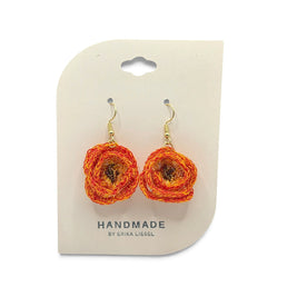Handmade by Erika Liesel Bloom crochet earrings in orange and yellow with beaded centers on a display card.