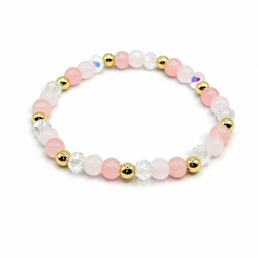Handmade by Erika Liesel blush pink glass bead bracelet with crystal accents and 18K gold-plated details.