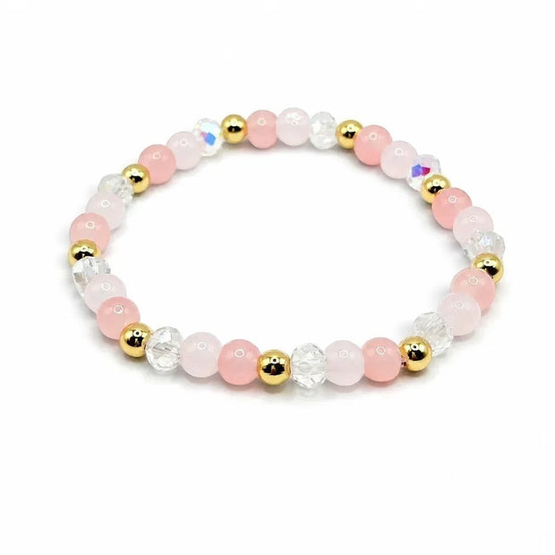 Handmade by Erika Liesel blush pink glass bead bracelet with crystal accents and 18K gold-plated details.