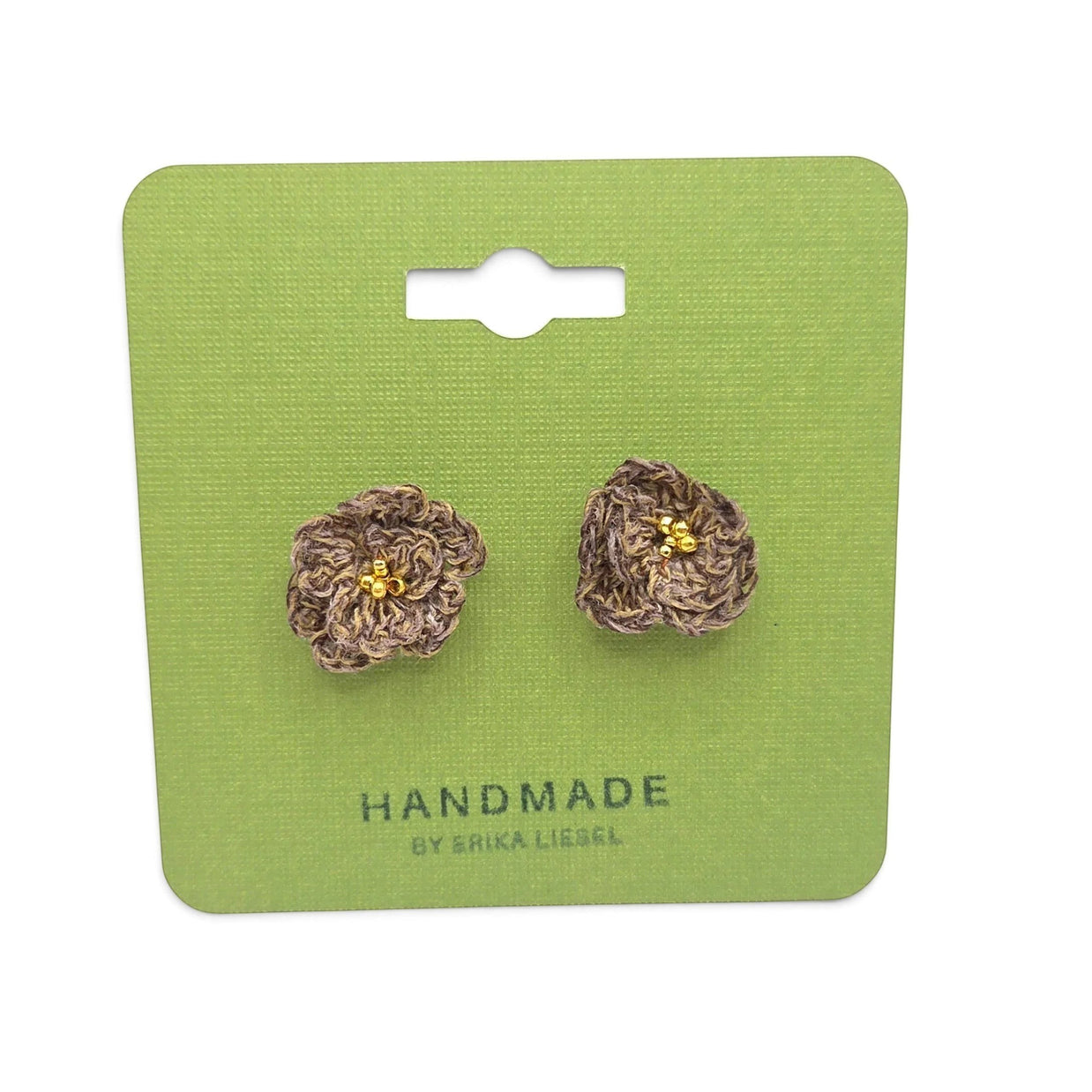 Handmade by Erika Liesel Bloom crochet flower earrings in brown thread with gold bead centers on green display card