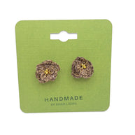 Handmade by Erika Liesel Bloom crochet flower earrings in brown thread with gold bead centers on green display card