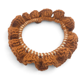 Handmade by Erika Liesel brown crochet scrunchie with a ruffled edge and white inner band for a soft, cozy look.