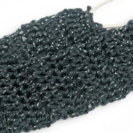 Handmade by Erika Liesel charcoal and gold metallic crochet headband with a tight stitch and elastic band