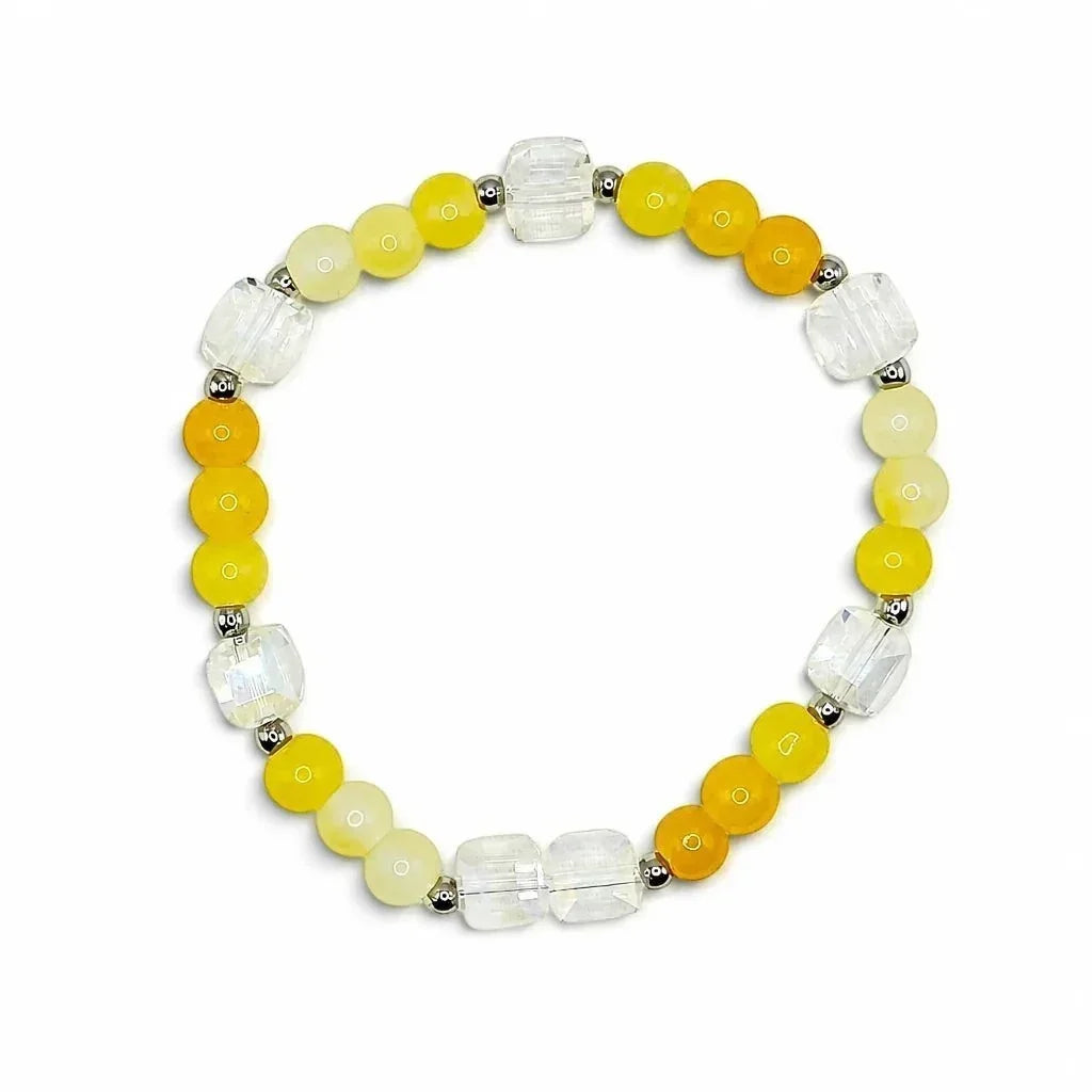 Handmade by Erika Liesel citrine bracelet featuring sunny yellow glass beads, faceted crystal, and silver accents.