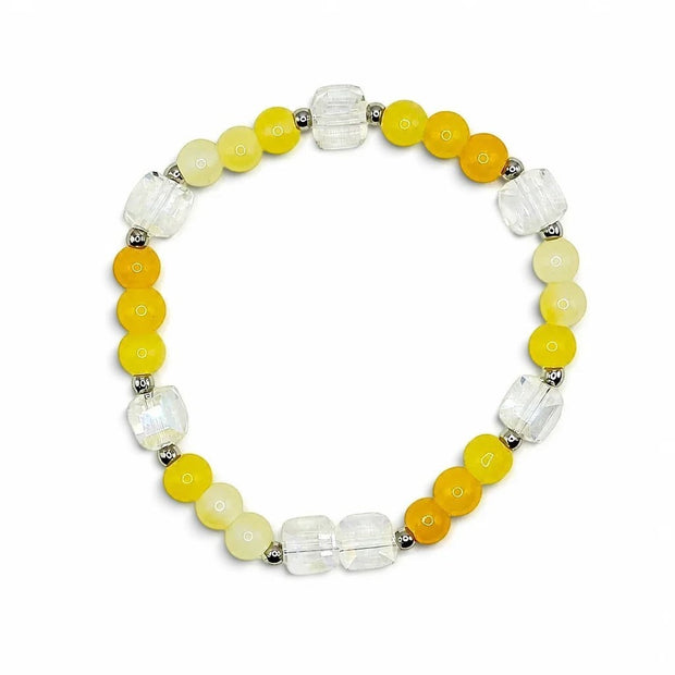 Handmade by Erika Liesel citrine bracelet featuring sunny yellow glass beads, faceted crystal, and silver accents.