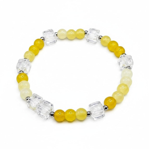 Handmade by Erika Liesel citrine bracelet featuring yellow glass beads, clear crystal cubes, and silver-tone accents.