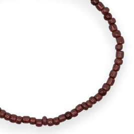 Handmade by Erika Liesel Clay bracelet featuring minimalist terracotta glass beads on a durable stretch cord.