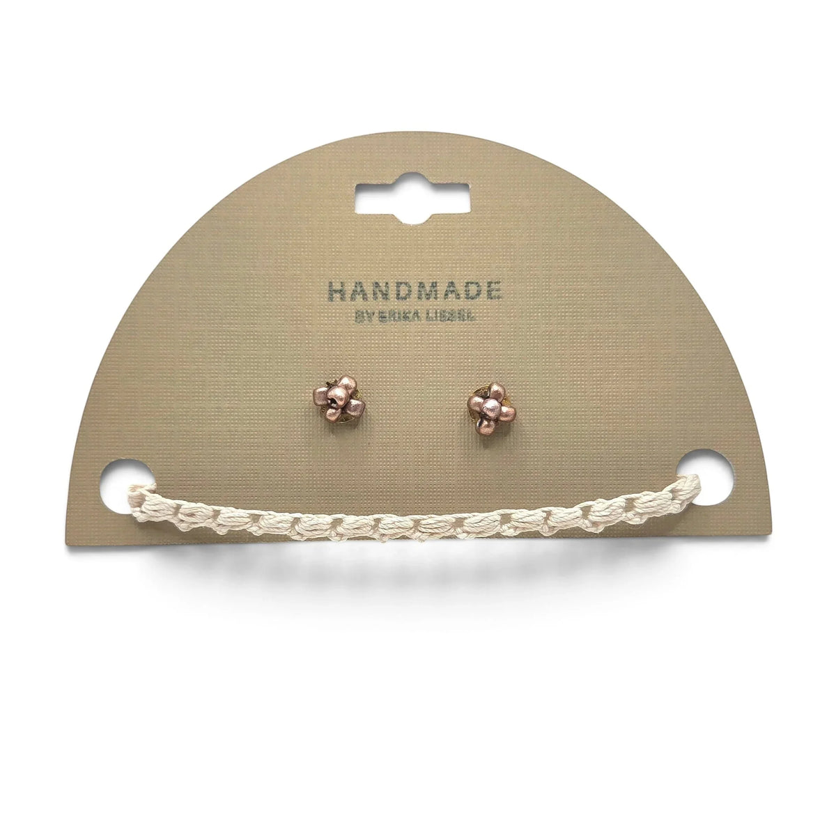 Handmade copper flower stud earrings with crochet accent on display card
