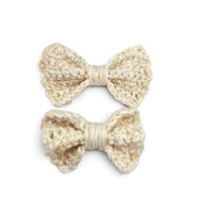 Handmade by Erika Liesel set of two cream-colored crochet bow barrettes with secure alligator clips