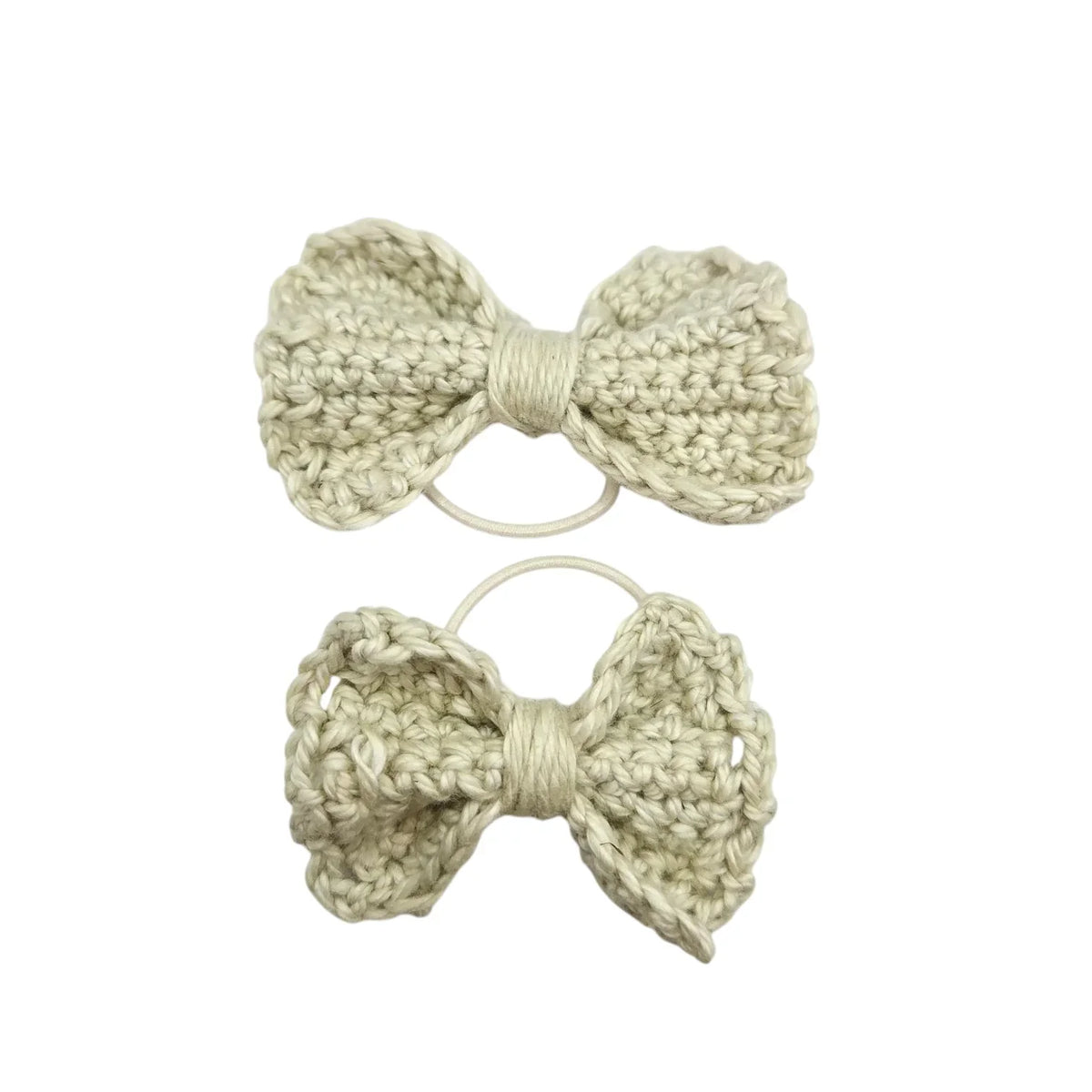 Handmade by Erika Liesel cream crochet bow hair tie set featuring two different sized textured yarn bows