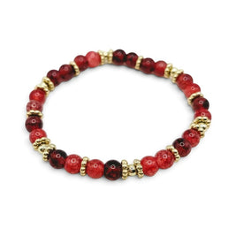 Handmade by Erika Liesel Crimson Charm Bracelet featuring ruby, cranberry, and burgundy glass beads with gold spacers.