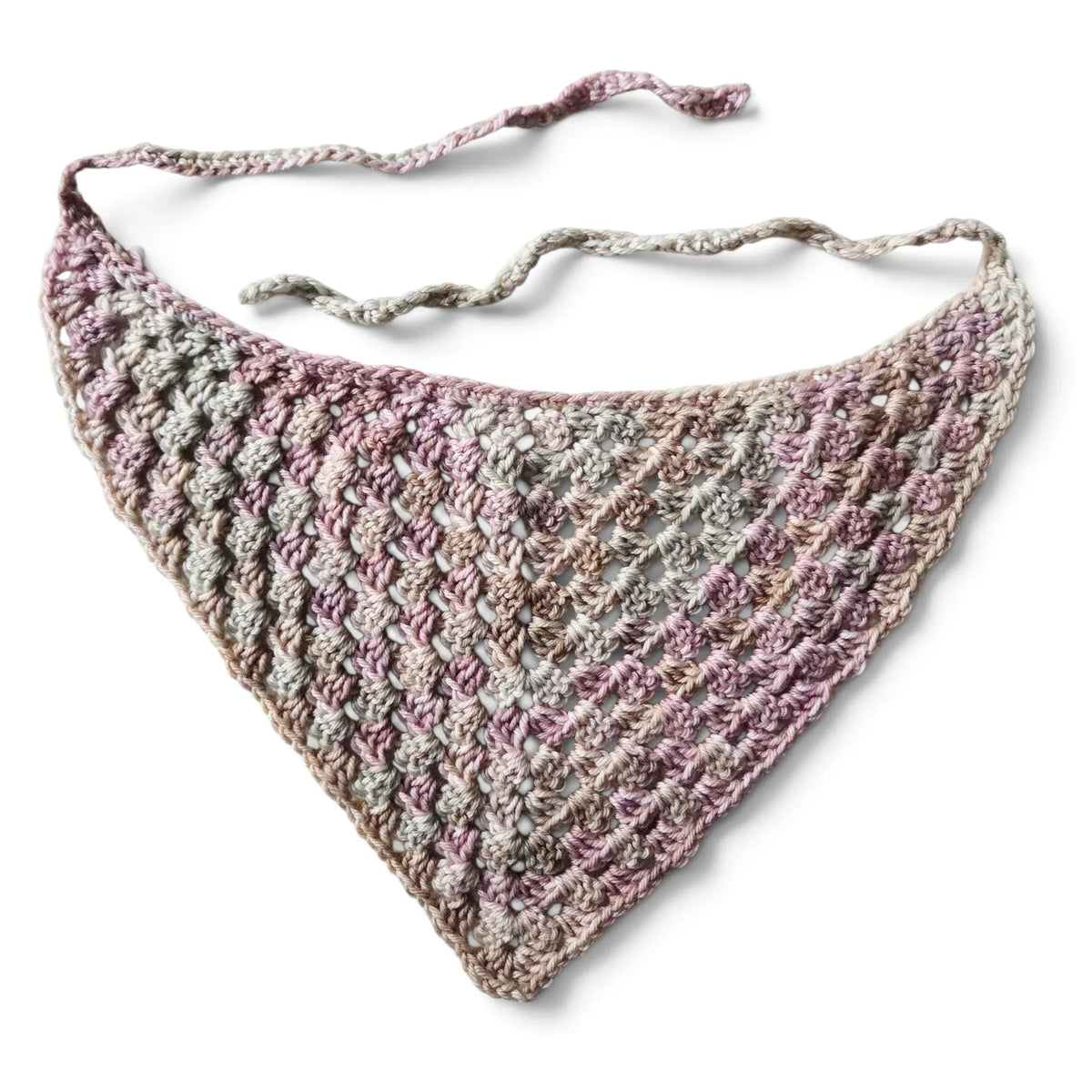 Handmade by Erika Liesel crochet bandana in a soft variegated pink and beige yarn with a lightweight open-knit design
