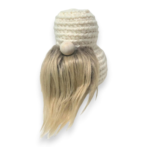 Handmade by Erika Liesel crochet gnome base with a cream body, wooden nose, and soft blonde faux fur beard.