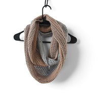 Handmade by Erika Liesel crochet infinity scarf in soft beige and grey acrylic blend yarn on a black hanger