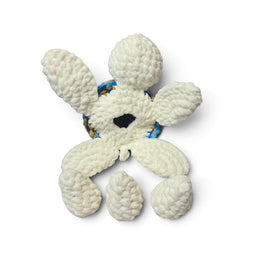 Handmade by Erika Liesel crochet turtle plushie in white with three removable eggs tucked inside its shell