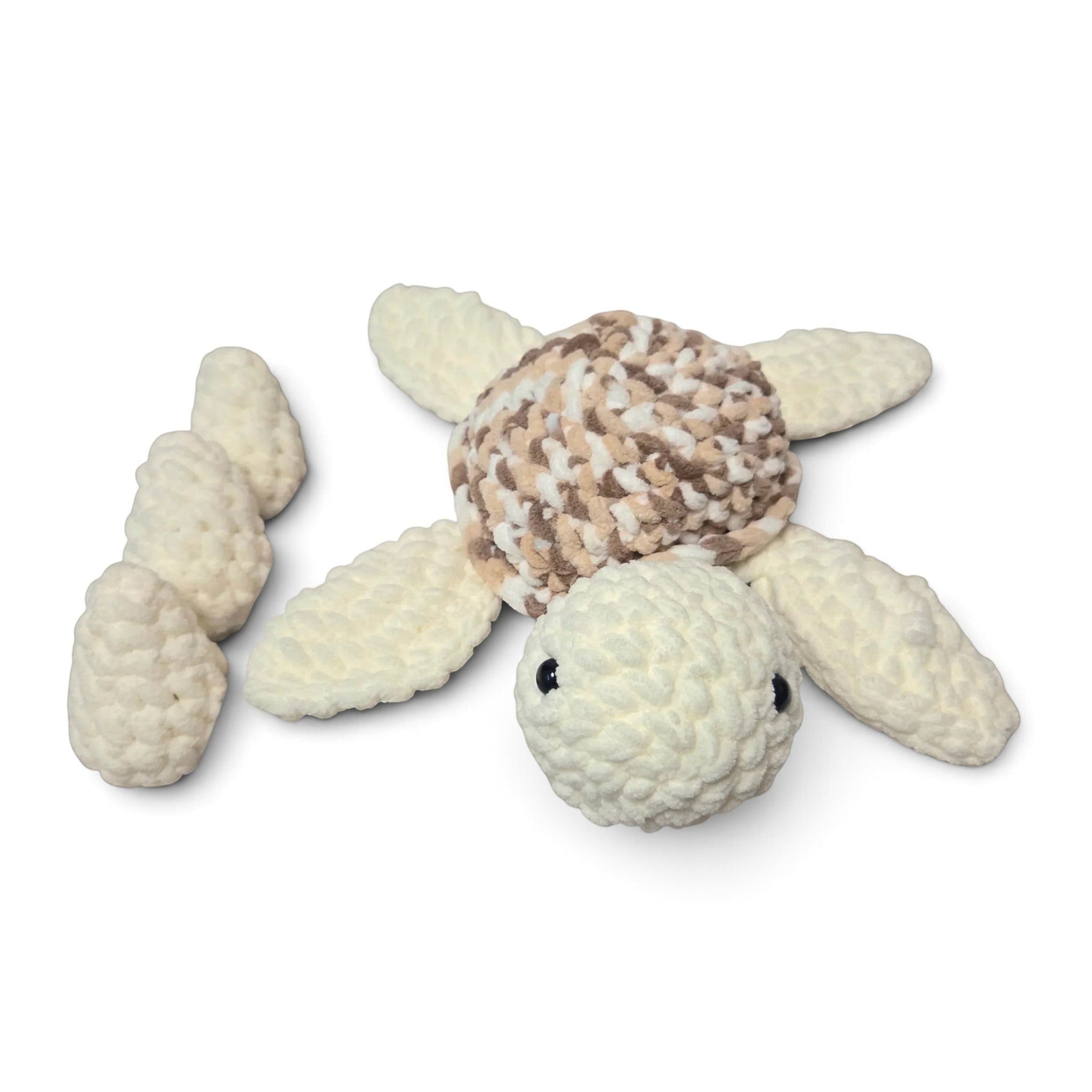 Handmade by Erika Liesel crochet turtle plushie in cream and brown with three removable matching eggs
